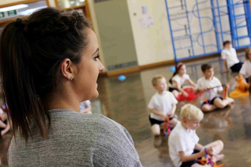 teacher teaching pe