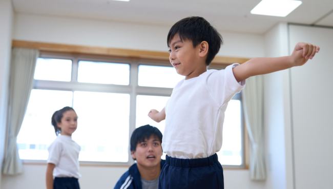 happy kids running into school