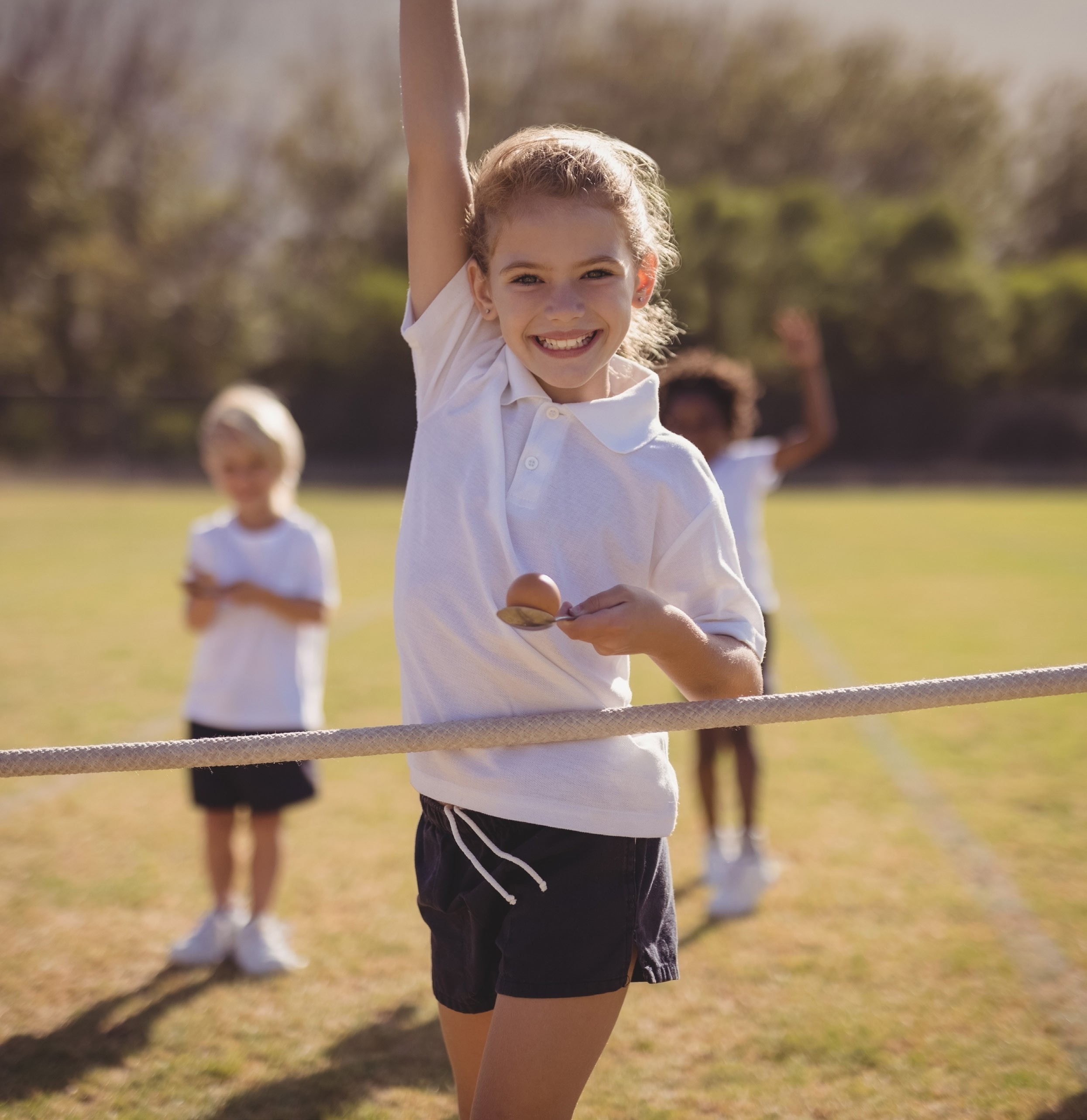 happy kids running into school